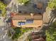 Aerial view of house and roof featuring solar panels at 2196 Via Dulcedo St, Mount Charleston, NV 89124
