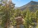 A-frame home nestled in a mountain setting at 2196 Via Dulcedo St, Mount Charleston, NV 89124