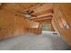 Unique loft space featuring carpet, wood paneling, and scenic views at 2196 Via Dulcedo St, Mount Charleston, NV 89124