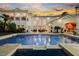 Resort-style pool and outdoor entertainment area with covered bar and seating, ideal for relaxation at 2349 Villandry Ct, Henderson, NV 89074