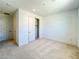 Carpeted bedroom featuring a closet at 9009 Shifting Skye St, Las Vegas, NV 89166