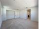 Spacious bonus room features neutral carpet, recessed lighting, and an open floorplan at 9009 Shifting Skye St, Las Vegas, NV 89166