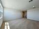 Bright, open bonus room with neutral carpet and ample natural light at 9009 Shifting Skye St, Las Vegas, NV 89166