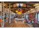 Inviting lobby area with hardwood floors, exposed ceiling beams, skylights, and attractive decor at 9009 Shifting Skye St, Las Vegas, NV 89166