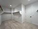 Walk-in closet with ample storage and shelving ready for organization at 9009 Shifting Skye St, Las Vegas, NV 89166