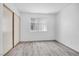 Bedroom featuring new flooring, neutral paint and a closet with slider doors at 367 Lander Dr, Henderson, NV 89074