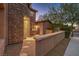 Stone exterior wall and walkway leading to a side entry at 8429 Brackenfield Ave, Las Vegas, NV 89178