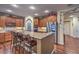 Large kitchen island with granite countertops and stainless steel appliances at 8429 Brackenfield Ave, Las Vegas, NV 89178