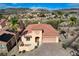 Aerial view of single story house with landscaped yard at 1150 Calcione Dr, Henderson, NV 89011