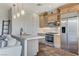 Modern kitchen with stainless steel appliances and quartz countertops at 1150 Calcione Dr, Henderson, NV 89011