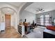 Home office with built-in shelving and hardwood floors at 1150 Calcione Dr, Henderson, NV 89011