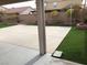 Artificial turf backyard with covered patio at 6449 Elizabethtown Ave, Las Vegas, NV 89110