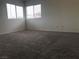 Spacious carpeted bedroom with large windows at 6449 Elizabethtown Ave, Las Vegas, NV 89110