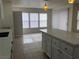 Kitchen with island and white cabinets at 6449 Elizabethtown Ave, Las Vegas, NV 89110