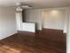 Living room featuring hardwood floors and a ceiling fan at 6449 Elizabethtown Ave, Las Vegas, NV 89110