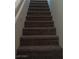 Carpeted staircase connecting floors in the house at 6449 Elizabethtown Ave, Las Vegas, NV 89110