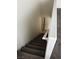 Carpeted stairs leading to the upper level at 6449 Elizabethtown Ave, Las Vegas, NV 89110