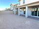 Large backyard with covered patio and block wall at 9886 Belikove Manor Ave, Las Vegas, NV 89178