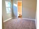 Spacious bedroom with carpeting and an ensuite bathroom at 9886 Belikove Manor Ave, Las Vegas, NV 89178