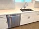 Stainless steel dishwasher with white shaker cabinets at 9886 Belikove Manor Ave, Las Vegas, NV 89178