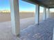 Covered patio with brick pavers and view of backyard at 9886 Belikove Manor Ave, Las Vegas, NV 89178