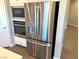 Stainless steel refrigerator with ice and water dispenser at 9886 Belikove Manor Ave, Las Vegas, NV 89178