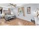 Inviting bedroom featuring wood floors and large windows at 1334 Eastwood Dr, Las Vegas, NV 89104