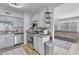 Modern kitchen with sleek gray cabinets, stainless steel appliances, and ample counter space at 1334 Eastwood Dr, Las Vegas, NV 89104