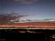 Nighttime view of the city skyline and surrounding mountains at 270 Besame Ct, Las Vegas, NV 89138