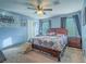 Primary bedroom with king-size bed, and two night stands at 4590 Lime Straight Dr, Las Vegas, NV 89115