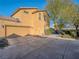 Two-story house with attached garage and driveway at 4590 Lime Straight Dr, Las Vegas, NV 89115