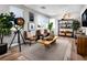 Game room with leather armchairs and a wooden coffee table at 9003 Shifting Skye St, Las Vegas, NV 89166