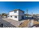 Two-story building with neutral paint, parking, and a palm tree in the distance at 4485 S Nellis Blvd, Las Vegas, NV 89121