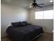 Bright bedroom featuring a king-size bed and ceiling fan at 5900 Gordon Ave, Las Vegas, NV 89108