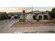 Single story home with landscaped yard and driveway at 5900 Gordon Ave, Las Vegas, NV 89108