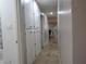 Clean hallway with tile flooring and built-in storage at 5900 Gordon Ave, Las Vegas, NV 89108