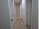 Clean hallway with tile flooring and built-in storage at 5900 Gordon Ave, Las Vegas, NV 89108