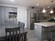 Eat-in kitchen with island and stainless steel appliances at 5900 Gordon Ave, Las Vegas, NV 89108