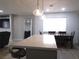 Kitchen island with seating and pendant lighting at 5900 Gordon Ave, Las Vegas, NV 89108