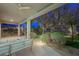 Outdoor space with spiral staircase, covered patio, and lush landscaping at 17 Winding Rd, Henderson, NV 89052