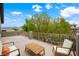 Outdoor balcony with contemporary patio furniture offers mountain views, ideal for relaxing and entertaining at 17 Winding Rd, Henderson, NV 89052