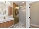 The bathroom features a large glass shower and stylish, modern decor at 17 Winding Rd, Henderson, NV 89052