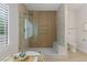 Spa bathroom featuring a glass-enclosed shower and gold fixtures at 17 Winding Rd, Henderson, NV 89052
