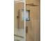 Modern bathroom shower with a square rain shower head and decorative tile at 17 Winding Rd, Henderson, NV 89052