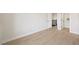 Bedroom featuring sleek floors, access to a closet, and staircase at 17 Winding Rd, Henderson, NV 89052