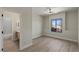 Sunlit bedroom with an ensuite bathroom featuring wood accents and a window view at 17 Winding Rd, Henderson, NV 89052