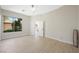 Bright, airy bedroom with a ceiling fan and a large window offering views of the outdoors at 17 Winding Rd, Henderson, NV 89052