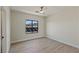 Minimalist bedroom with modern window overlooking neighborhood at 17 Winding Rd, Henderson, NV 89052