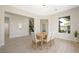 Well-lit dining room featuring elegant decor and views to the neighboring living spaces at 17 Winding Rd, Henderson, NV 89052