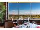 Upscale dining area features amazing mountain views from the large windows at 17 Winding Rd, Henderson, NV 89052